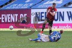 3. Liga - Hansa Rostock - FC Ingolstadt 04 - Stefan Kutschke (30, FCI) scheitert an Jan Löhmannsröben (24 Rostock)