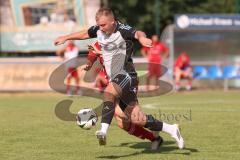 Testspiel - Bezirksliga - Saison 2025/26 - TSV Ober./Unterhaunstadt - Türkisch Ingolstadt  - Baha Asici rot Türkisch  - Florian Diegel weiss Ober./Unterh.stadt - Foto: Meyer Jürgen