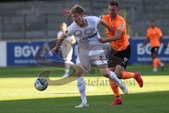 3.Liga - Saison 2023/2024 - SC Freiburg II - FC Ingolstadt 04 - Joel Bichsel (Nr.25 - Freiburg II) - Jannik Mause (Nr.7 - FCI) - Foto: Meyer Jürgen