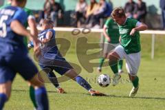 2023_10_28 - Kreisliga - Saison 2023/24 - SV Menning - FC Gerolfing  - Philipp Haunschild grüb Gerolfing - Philip Wolfsfellner blau Menning - Foto: Meyer Jürgen