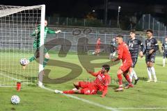 Bayernliga Süd - Saison 2022/2023 - FC Ingolstadt 04 -  VFB Hallbergmoos - Gashi Egson (Nr.9 - Fc Ingolstadt 04 II) mit einer Torchance - Carl Opitz schwarz Hallbergmoos - Dominic Dachs Torwart Hallbergmoos - Karaogul Ishak (Nr.10 - Fc Ingolstadt 04 II) -