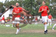 Toto Pokal - Saison 2022/2023 - SpVgg Heßdorf - FC Ingolstadt 04 - Die Spieler vertreten das Spielfeld zum warm machen - Nico Antonitsch (Nr.5 - FCI) - Tobias Schröck (Nr.21 - FCI) - Foto: Meyer Jürgen