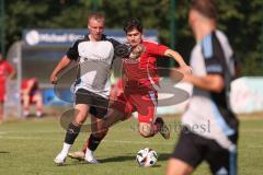 Testspiel - Bezirksliga - Saison 2025/26 - TSV Ober./Unterhaunstadt - Türkisch Ingolstadt  - Baha Asici rot Türkisch  - Florian Diegel weiss Ober./Unterh.stadt - Foto: Meyer Jürgen