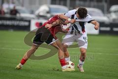 Saison 2026/27 - Freundschaftsspiel - 1. FC Nürnberg - FC Ingolstadt 04 - Andrea Ceresoli (Nr.14 - FCN) - Timo Hengmith (Nr.44 - FCI) - Foto: Meyer Jürgen