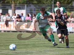 Relegation - Saison 2025/26 - SV Karlskron - FC Geisenfeld - Stefan Schmailzl grün Geisenfeld - Paul Dorschner schwarz Karlskron  - Foto: Meyer Jürgen