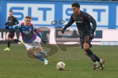 3. Liga - Saison 2025/26 - Hansa Rostock - FC Ingolstadt 04  - Carlsen Frederic Bennedsgaard (Nr.8 - FCI) - Cedric Harenbrock (Nr.8 - Hansa Rostock) - Foto: Meyer Jürgen