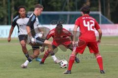 Testspiel - Bezirksliga - Saison 2025/26 - TSV Ober./Unterhaunstadt - Türkisch Ingolstadt  - Fabio Udella weiss Ober./Unterh.stadt - Ousseynou Tamba rot Türkisch  - Foto: Meyer Jürgen