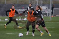 3. Liga; FC Ingolstadt 04 - Trainingsauftakt Winterpause; Zweikampf Kampf um den Ball Valmir Sulejmani (7, FCI) Tim Civeja (8, FCI)