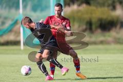 Kreisklasse - Saison 2023/2024 -SV Zuchering - SV Oberstimm - Julian Weidinger schwarz Oberstimm - Lukas Högele rot Zuchering - Foto: Meyer Jürgen