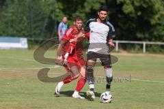 Testspiel - Bezirksliga - Saison 2025/26 - TSV Ober./Unterhaunstadt - Türkisch Ingolstadt  - Avni Avdijaj rot Türkisch  - Enes Erdogan weiss Ober./Unterh.stadt - Foto: Meyer Jürgen