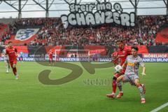3. Liga; FC Ingolstadt 04 - SSV Jahn Regensburg; Fan Fankurve Banner Fahnen Spruchband Yann Sturm (7, FCI) Zweikampf Kampf um den Ball Oliveira Nicolas (25 SSV)