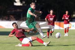 Kreisliga - Saison 2023/2024 - FC Gerolfing - Türk SV Ingolstadt - Lukas Achhammer grün Gerolfing - Halil Balaban rot Türk SV - Foto: Meyer Jürgen
