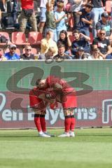 3. Liga; FC Ingolstadt 04 - FC Hansa Rostock; Tor Jubel Treffer 1:0 Dennis Kaygin (10, FCI) bläst Luftballon auf Simon Lorenz (32, FCI)