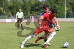 Testspiel - Bezirksliga - Saison 2025/26 - FC Fatih Ingolstadt - TSV Burgheim - Atilla Demir rot Fatih - Niklas Marx blau Burgheim - Foto: Meyer Jürgen