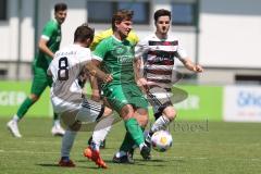 Bezirksliga - Saison 2024/25 - Freundschaftsspiel - FC Gerolfing - SV Kasing - Philipp Haunschild (Nr.12 - FC Gerolfing) - Tobias Wolfsfellner (Nr.8 - SV Kasing) - Foto: Meyer Jürgen
