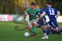 Kreisliga - Saison 2023/2024 - FC Gerolfing - TSV Ober/Unterhaunstadt - Anastasios Porfyriadis grün Gerolfing - David Polster blau Oberhaunstadt - Foto: Meyer Jürgen