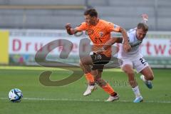 3.Liga - Saison 2023/2024 - SC Freiburg II - FC Ingolstadt 04 - Moritz Seiffert (Nr.23 - FCI) - Philip Fahrner (Nr.23 - Freiburg II) - Foto: Meyer Jürgen