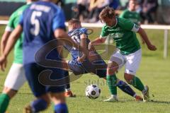 2023_10_28 - Kreisliga - Saison 2023/24 - SV Menning - FC Gerolfing  - Philipp Haunschild grüb Gerolfing - Philip Wolfsfellner blau Menning - Foto: Meyer Jürgen