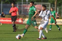 Freundschaftsspiel - Saison 2023/2024 - SV Manching - AL Jazira - Sebastian Graßl (Nr.10 - SV Manching) - Oumar Traore weiss AL Jazira -  Foto: Meyer Jürgen