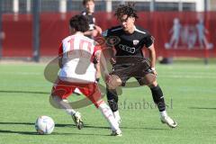 B-Junioren Bundesliga  - Saison 2023/24 - B-Junioren - FC Ingolstadt 04 - FC Bayern München - Polat Arel schwarz FCI - Nasrawe Jussef weiss München - Foto: Meyer Jürgen