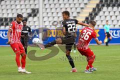 3.Liga - Saison 2022/2023 - SC Freiburg II - FC Ingolstadt 04 - Marcel Costly (Nr.22 - FCI) - Julian Guttau (Nr.36 - SC Freiburg II) -  - Foto: Meyer Jürgen