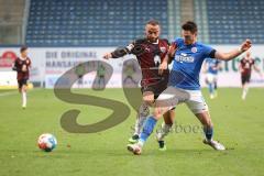 2.BL; Hansa Rostock - FC Ingolstadt 04; Zweikampf Kampf um den Ball Fatih Kaya (9, FCI) Malone Ryan (16 HR)