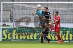 3.Liga - Saison 2022/2023 - SC Freiburg II - FC Ingolstadt 04 -  Torwart Marius Funk (Nr.1 - FCI) klärt mit einer Faustabwehr - Calvin Brackelmann (Nr.17 - FCI) - Andi Hotti (Nr.3 - SC Freiburg II) - - Foto: Meyer Jürgen