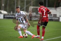 Saison 2026/27 - Freundschaftsspiel - 1. FC Nürnberg - FC Ingolstadt 04 - Jonas Scholz (Nr.15 - FCI) - Rayan Ghrieb (Nr.7 - FCN) - Foto: Meyer Jürgen