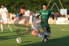 Kreisliga - Saison 2023/24 - Relegation zur BZL - FC Gerolfing - SV Aschau - Niklas Nissl grün Gerolfing - Konstantin Karamanlis weiss Aschau - Foto: Meyer Jürgen