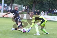 Bezirksliga - Saison 2022/2023 - SV Manching  - SV Lerchenau - Schreiner Thomas (Nr.11 - SV Manching) - Angermeier Matthias Torwart Lerchenau - Foto: Meyer Jürgen