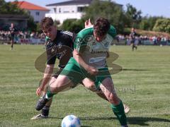 Relegation - Saison 2025/26 - SV Karlskron - FC Geisenfeld - Stefan Schmailzl grün Geisenfeld - Paul Dorschner schwarz Karlskron  - Foto: Meyer Jürgen