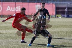 A - Junioren Bundesliga Süd/Südwest -  Saison 2021/2022 - FC Ingolstadt 04 - FC Bayern München - Dibrani Benjamin schwarz Bayern M. #28 - Udogu David (#3 FCI) - Foto: Meyer Jürgen