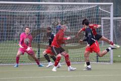 Bezirksliga - 2022/2023 - FC Fatih Ingolstadt - SpVgg Feldmoching - Patrick Jännerwein Torwart Feldmoching - Akif Abasikeles schwarz Fatih mit einem Kopfball - - Foto: Meyer Jürgen