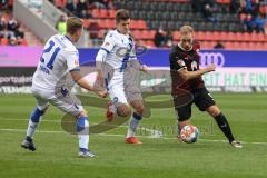 2.BL; FC Ingolstadt 04 - Karlsruher SC; Strum Zweikampf Kampf um den Ball Maximilian Beister (11, FCI) Thiede Marco (21 KSC) Wanitzek Marvin (10 KSC)