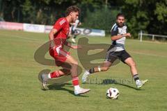 Testspiel - Bezirksliga - Saison 2025/26 - TSV Ober./Unterhaunstadt - Türkisch Ingolstadt  - Enis Kuqanaj rot Türkisch  - Firat Acar weiss Ober./Unterh.stadt - Foto: Meyer Jürgen