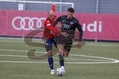 Bayernliga Süd - Saison 2021/2022 - FC Ingolstadt 04 II -  SpVgg Unterhaching - Arian Llugiqi #9 FCI - Manuel Stiefler #8 rot Haching - Foto: Meyer Jürgen