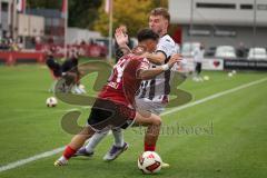 Saison 2026/27 - Freundschaftsspiel - 1. FC Nürnberg - FC Ingolstadt 04 - Andrea Ceresoli (Nr.14 - FCN) - Benjamin Kanuric (Nr.37 - FCI) - Foto: Meyer Jürgen