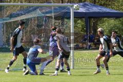 Kreisliga - Saison 2024/25- SV Menning - TSV Ober/Unterhaunstadt-  - Ali Cakmakci Torwart grau Ober/Haunstadt kann einen Ball abwehren von Florian Dormeier blau Menning - XXXXX - Foto: Meyer Jürgen