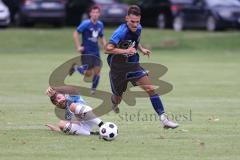 Kreisliga - Saison 2023/2024 - SV Menning  - FC Sandersdorf - Simon Wolfsfellner blau Menning - Manuel Recum weiss Sandersdorf - Foto: Meyer Jürgen
