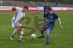 Kreisliga 1 - DJK Ingolstadt - TSV Ober/Unterhaunstadt - Michael Grassl weiss DJK Ingolstadt - Leo Meier blau Ober/Unterhaunstadt - Foto: Jürgen Meyer