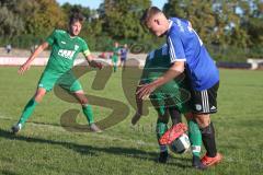 401 Kreisliga 1 - DJK Ingolstadt - TSV Gaimersheim -  Fabian Kuppe blau DJK Ingolstadt - Daniel Sierck grün Gaimersheim - Foto: Jürgen Meyer