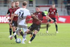 3.Liga - Saison 2023/2024 - SC Verl - FC Ingolstadt 04 -Felix Keidel (Nr.43 - FCI) - Michel Stöcker (Nr.24 - Verl) -   - Foto: Meyer Jürgen