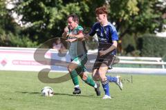 Kreisklasse - Saison 2025/26- SV Haunwöhr - FC Geisenfeld  - Tim Schirmer blau Haunwöhr - Lukas Kellermann grün Geisenfeld - Foto: Meyer Jürgen