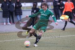 Freundschaftsspiel - FC Fatih Ingolstadt - TV Aiglsbach - Boubacarr Saho schwarz FC Fatih - Fabian Rasch grün Aiglsbach - Foto: Meyer Jürgen