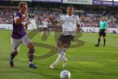 3.Liga - Saison 2022/2023 - VFL Osnabrück - FC Ingolstadt 04 - Robert Tesche (Nr.8 - VFL Osnabrück) - Justin Butler (Nr.31 - FCI) - Foto: Meyer Jürgen