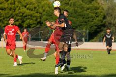 Bezirksliga - Saison 2022/2023 - FC Fatih Ingolstadt - SV Manching  - Jonas Prawda schwarz Manching - Umut Yürükal rot FC Fatih - Foto: Meyer Jürgen