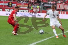 3. Liga - Saison 2023/24 - Rot-Weiss Essen - FC Ingolstadt 04 -  - Benjamin Kanuric (Nr.8 - FCI) - Nils Kaiser (#18 Essen) - Foto: Meyer Jürgen