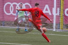 A - Junioren Bundesliga Süd/Südwest -  Saison 2021/2022 - FC Ingolstadt 04 - 1. FC Saarbrücken - Riedl Fabio (#18 FCI) mit einem Schuss auf das Tor - Hartz Elias Torwart Saarbrücken - Foto: Meyer Jürgen