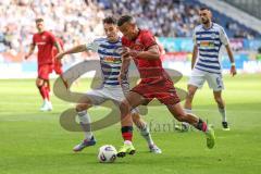 3. Liga; MSV Duisburg - FC Ingolstadt 04; Zweikampf Kampf um den Ball Marcel Costly (22, FCI) Noß Conor (14 MSV) Bulic Rasim (6 MSV)
