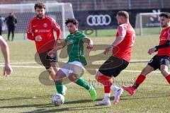 2024_2_17 - Saison 2023/24 - AUDI-Schanzer Amateur Cup - FC Gerolfing - TV 1861 Ingolstadt - Halbfinale 2 - Thomas Schäffer rot 1861 Ing. - Altan Calim grün Gerolfing - Foto: Meyer Jürgen